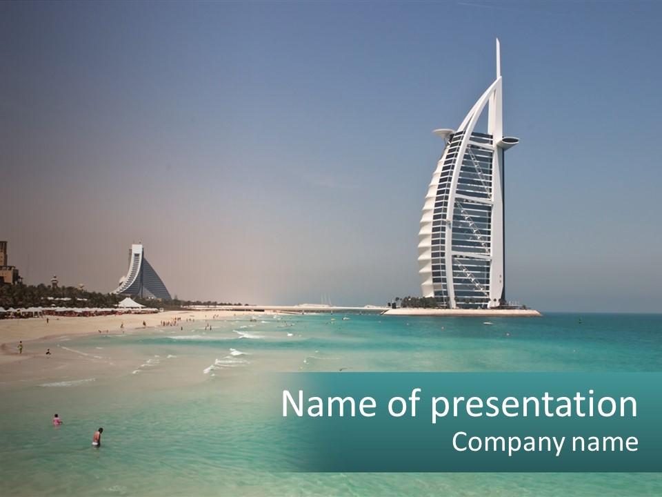 A Picture Of A Beach With A Very Tall Building In The Background PowerPoint Template