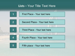A Picture Of A Beach With A Very Tall Building In The Background PowerPoint Template