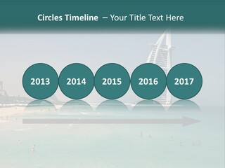 A Picture Of A Beach With A Very Tall Building In The Background PowerPoint Template