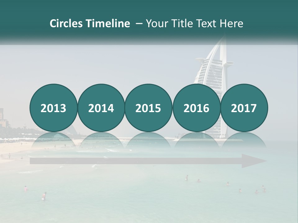 A Picture Of A Beach With A Very Tall Building In The Background PowerPoint Template