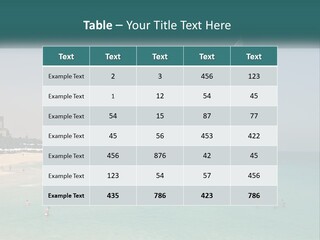 A Picture Of A Beach With A Very Tall Building In The Background PowerPoint Template