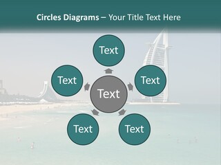 A Picture Of A Beach With A Very Tall Building In The Background PowerPoint Template