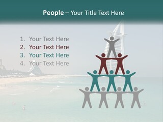 A Picture Of A Beach With A Very Tall Building In The Background PowerPoint Template