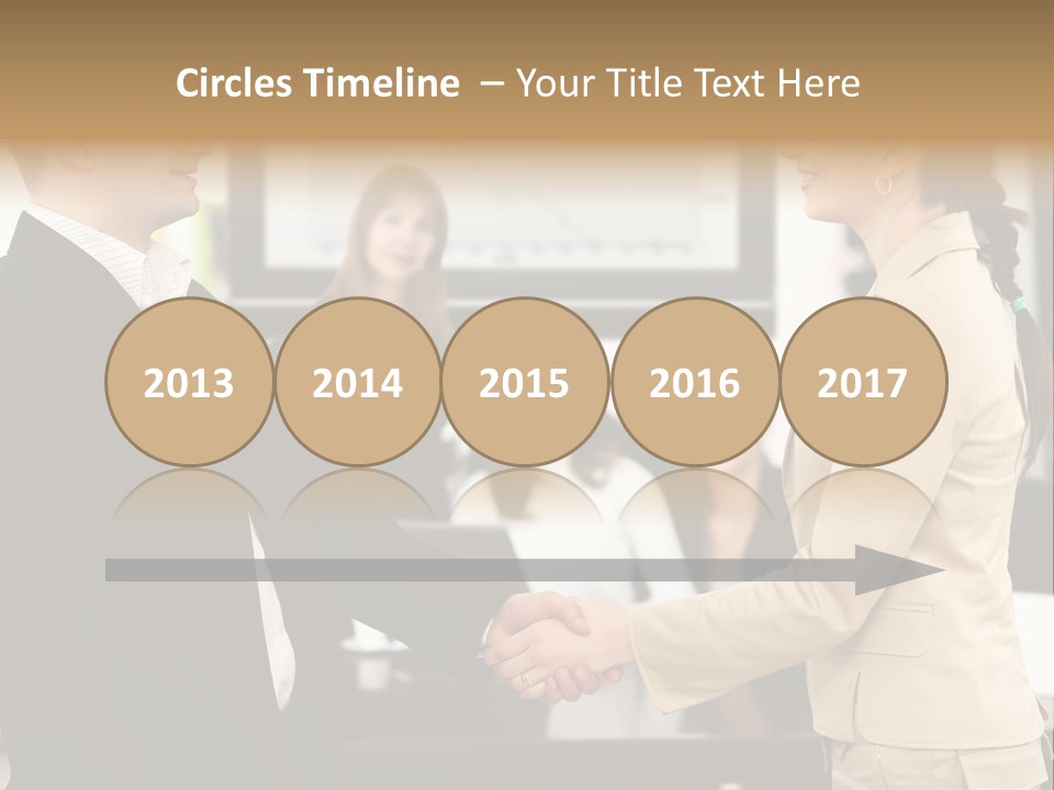 Two People Shaking Hands In Front Of A Group Of People PowerPoint Template