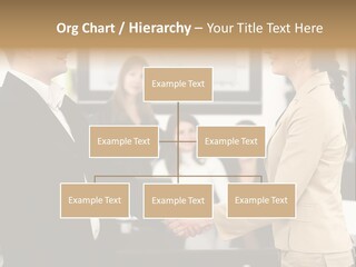 Two People Shaking Hands In Front Of A Group Of People PowerPoint Template