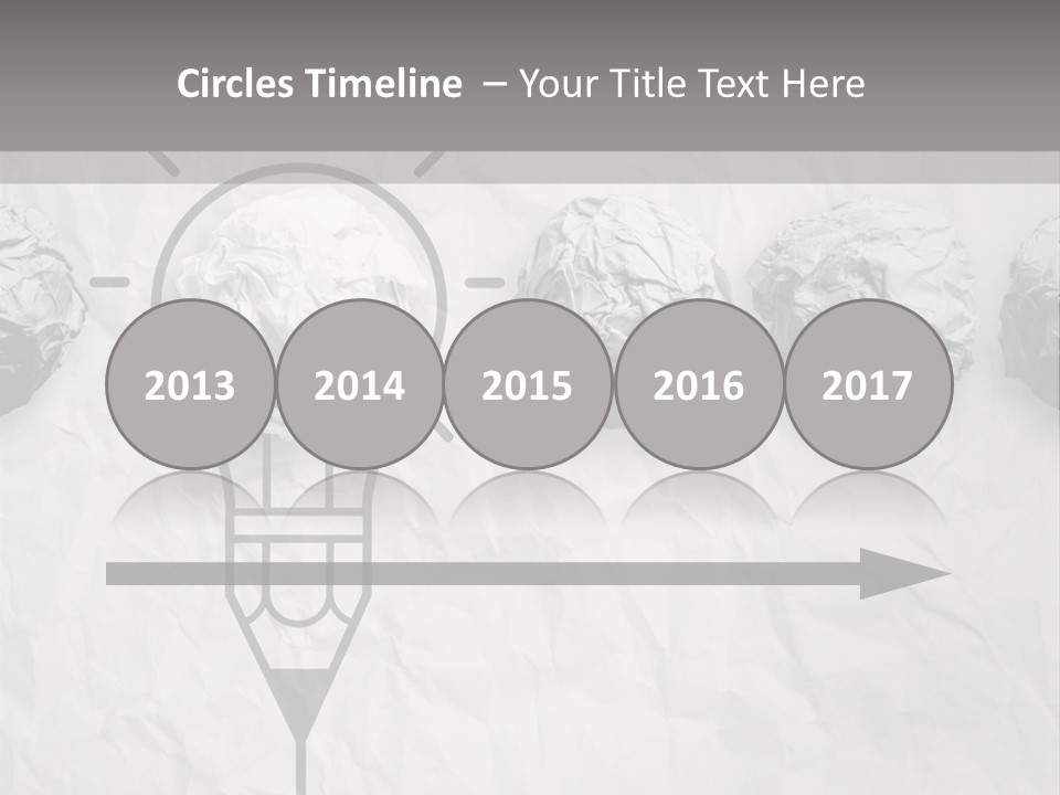 A Light Bulb With Crumpled Paper On It PowerPoint Template