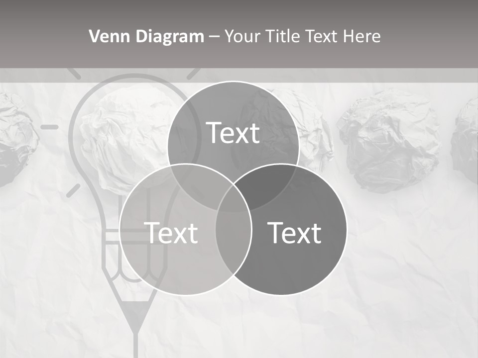 A Light Bulb With Crumpled Paper On It PowerPoint Template
