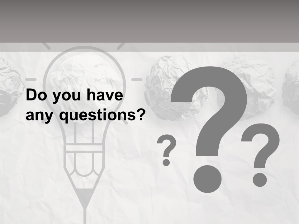 A Light Bulb With Crumpled Paper On It PowerPoint Template