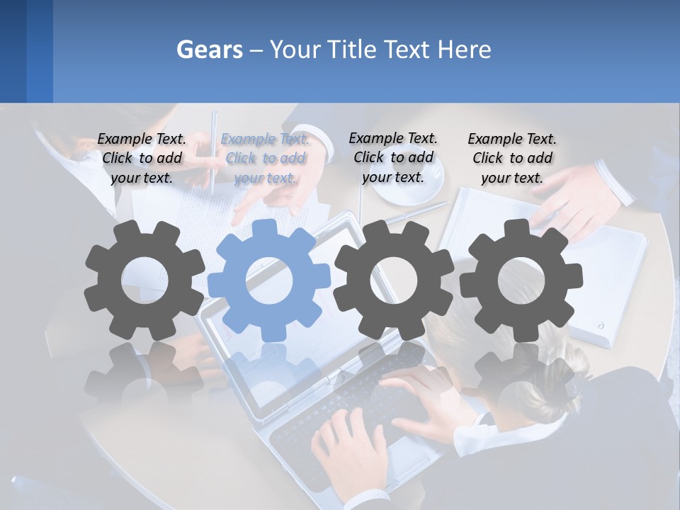 A Group Of People Sitting Around A Table Working On A Laptop PowerPoint Template