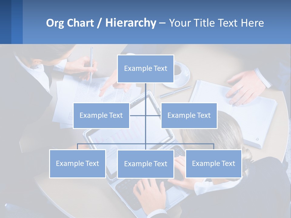 A Group Of People Sitting Around A Table Working On A Laptop PowerPoint Template