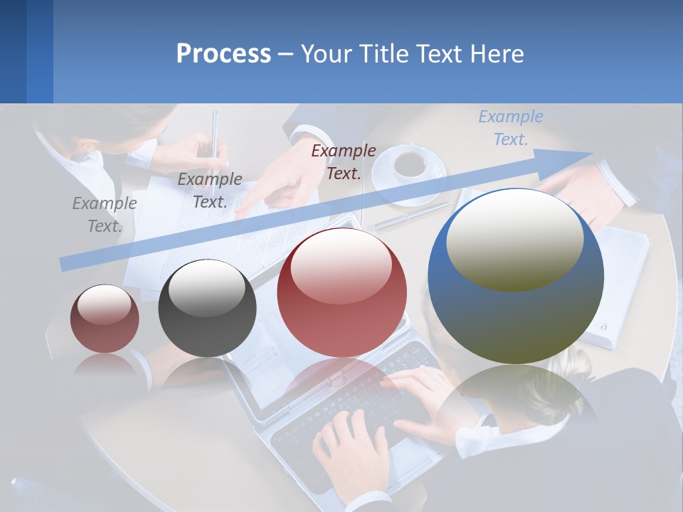 A Group Of People Sitting Around A Table Working On A Laptop PowerPoint Template