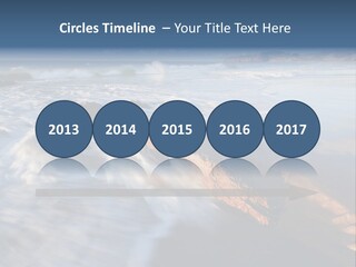 A Rocky Beach With Waves Crashing On It PowerPoint Template