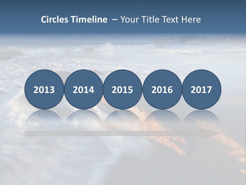 A Rocky Beach With Waves Crashing On It PowerPoint Template