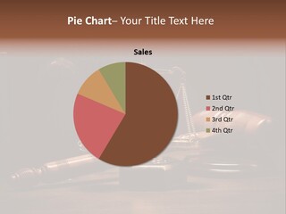 A Gaven And Scale On A Table With A Book In The Background PowerPoint Template