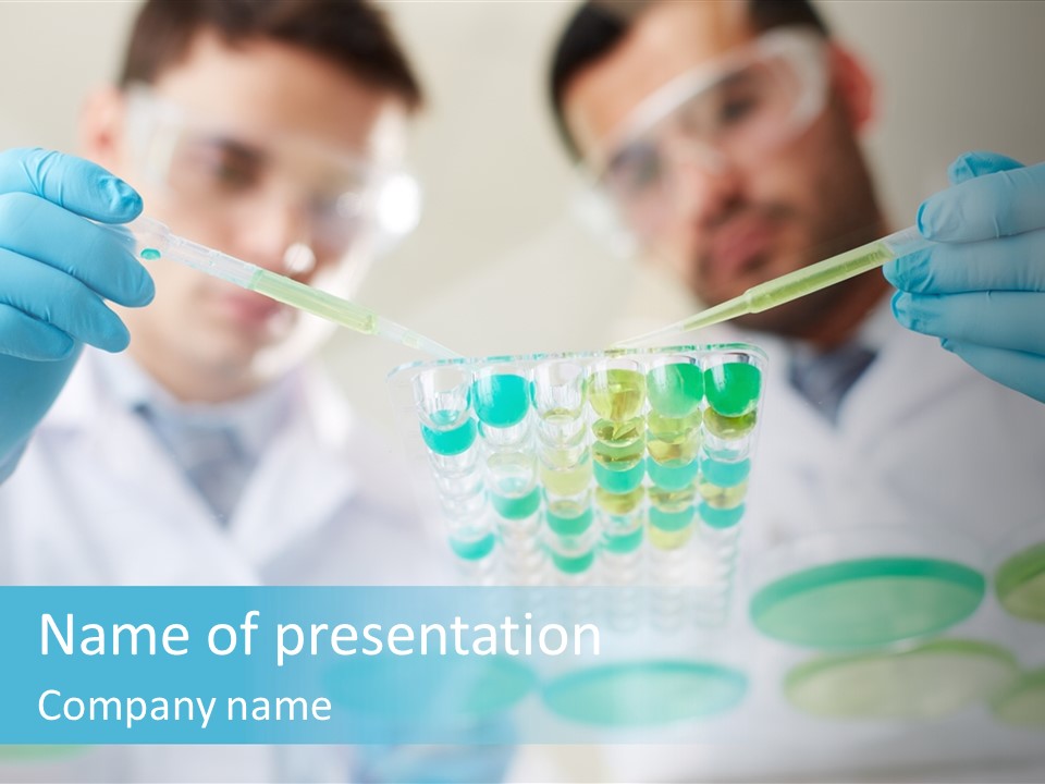 Two Men In Lab Coats Holding Test Tubes PowerPoint Template