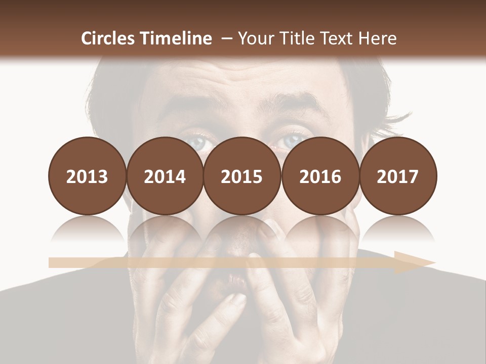 A Man In A Suit Covers His Mouth With His Hands PowerPoint Template