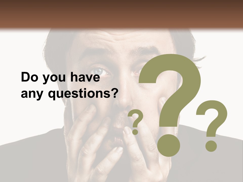 A Man In A Suit Covers His Mouth With His Hands PowerPoint Template