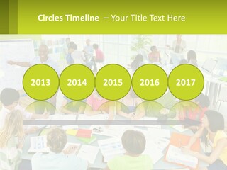 A Group Of People Sitting Around A Table With Papers PowerPoint Template