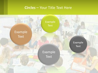 A Group Of People Sitting Around A Table With Papers PowerPoint Template