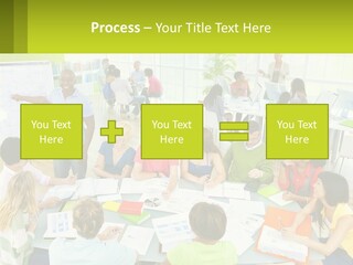 A Group Of People Sitting Around A Table With Papers PowerPoint Template