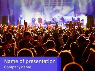 A Large Crowd Of People At A Concert PowerPoint Template