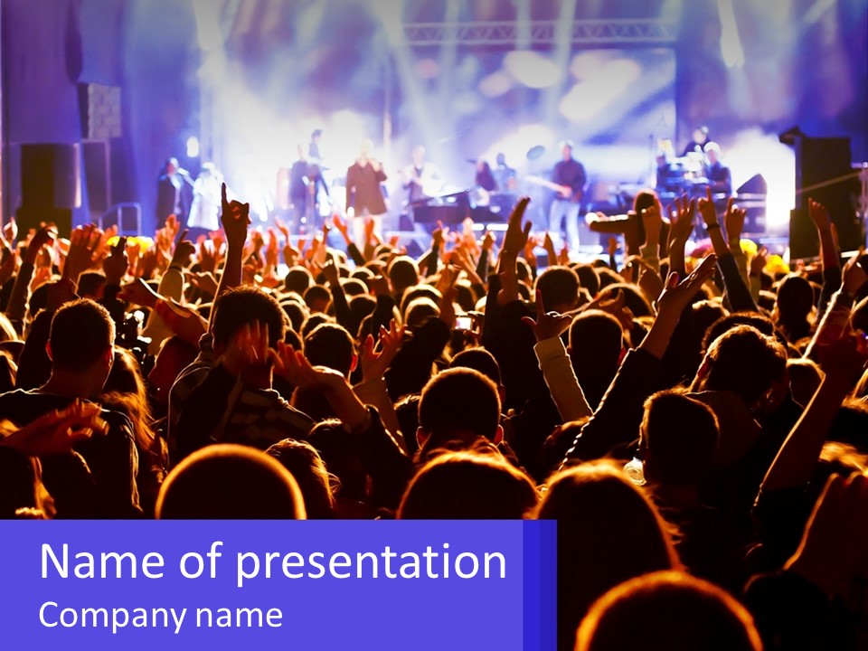 A Large Crowd Of People At A Concert PowerPoint Template