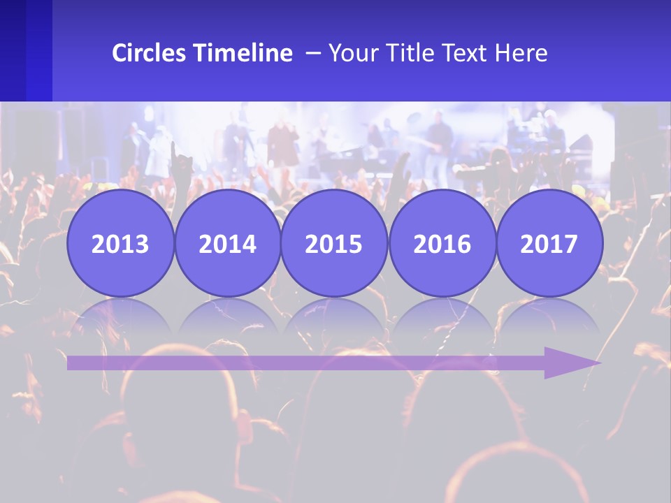 A Large Crowd Of People At A Concert PowerPoint Template