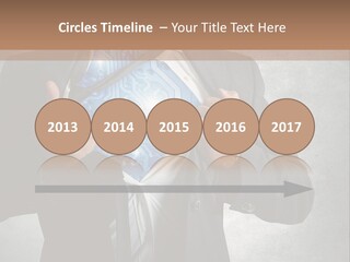 A Man In A Suit Holding A Blue Circuit Board In His Chest PowerPoint Template