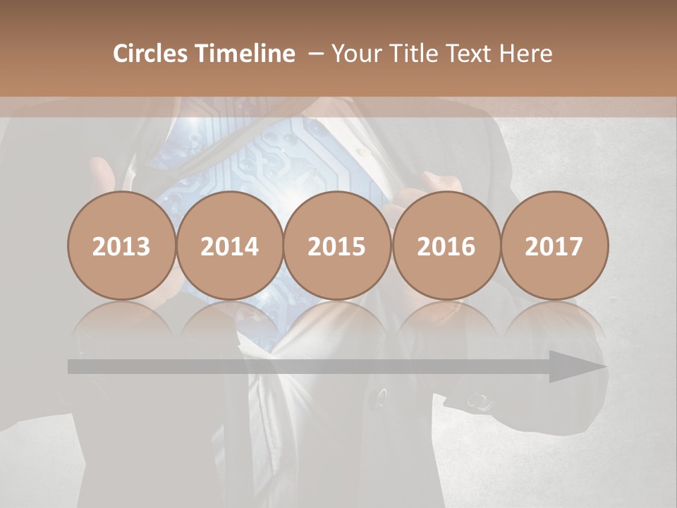 A Man In A Suit Holding A Blue Circuit Board In His Chest PowerPoint Template