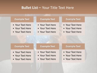 A Man In A Suit Holding A Blue Circuit Board In His Chest PowerPoint Template