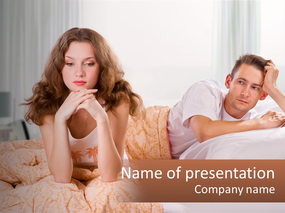 A Man And A Woman Laying On A Bed PowerPoint Template