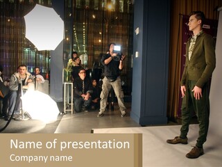 A Man Standing In Front Of A Group Of People PowerPoint Template