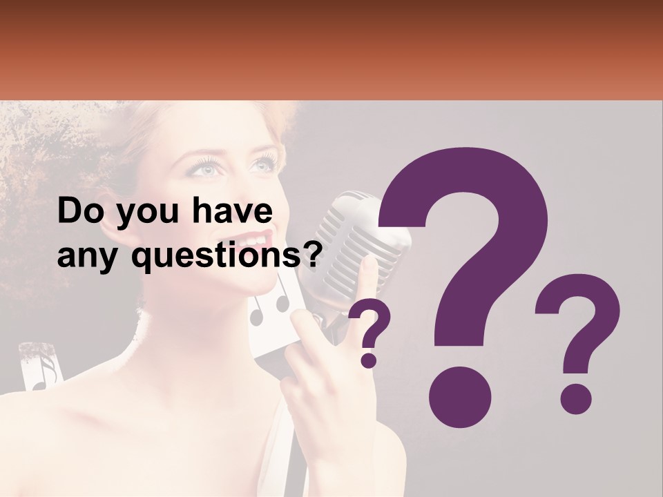 A Woman Holding A Microphone In Front Of Her Face PowerPoint Template