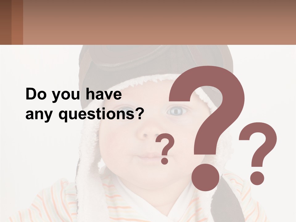 A Baby Wearing A Monkey Hat With A Name Tag PowerPoint Template