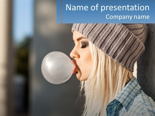 A Woman Blowing A Bubble Into Her Mouth PowerPoint Template