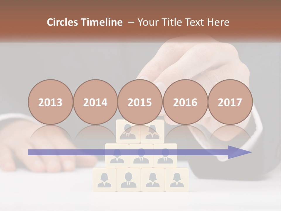 A Man In A Suit Placing Blocks On Top Of A Table PowerPoint Template