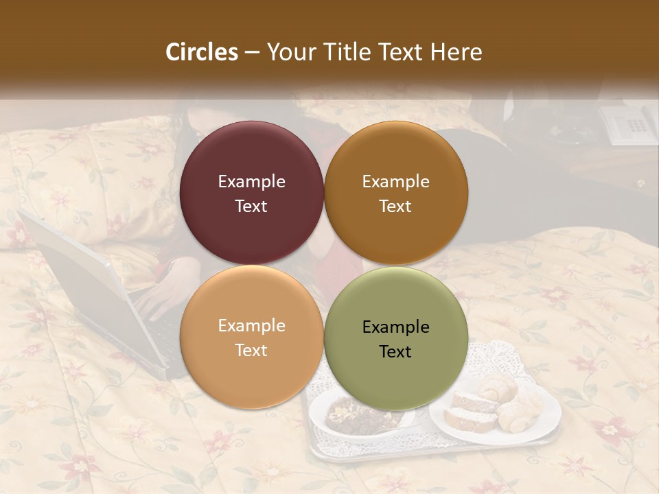 A Woman Laying On A Bed With A Laptop And A Glass Of Orange Juice PowerPoint Template