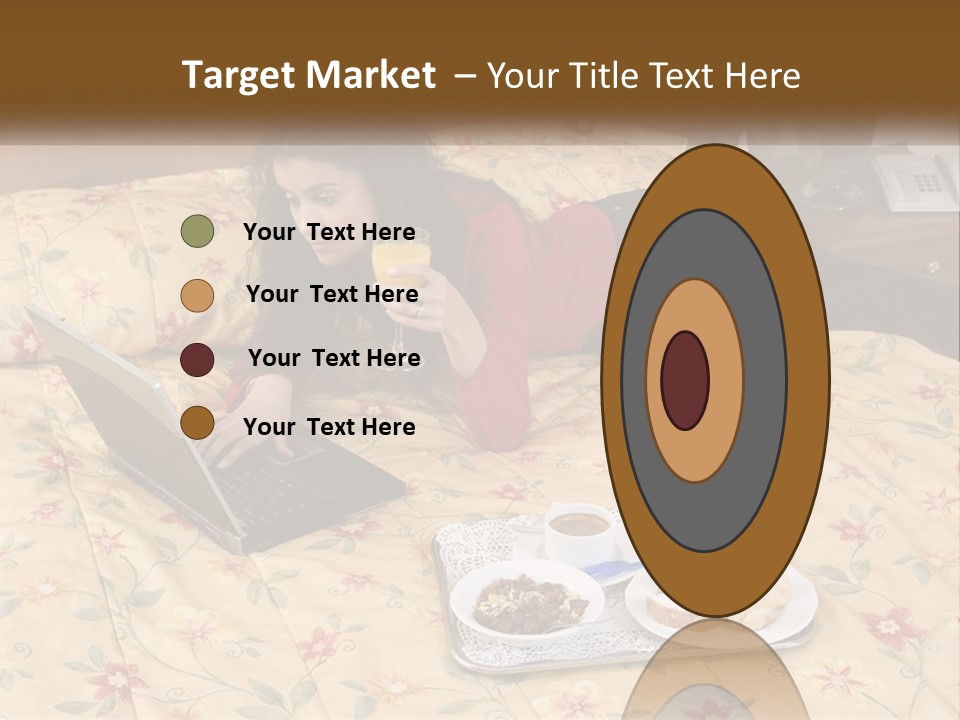 A Woman Laying On A Bed With A Laptop And A Glass Of Orange Juice PowerPoint Template