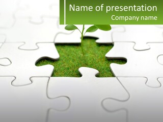 A Piece Of Puzzle With A Plant Growing Out Of It PowerPoint Template