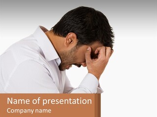 A Man Holding His Head In His Hands PowerPoint Template