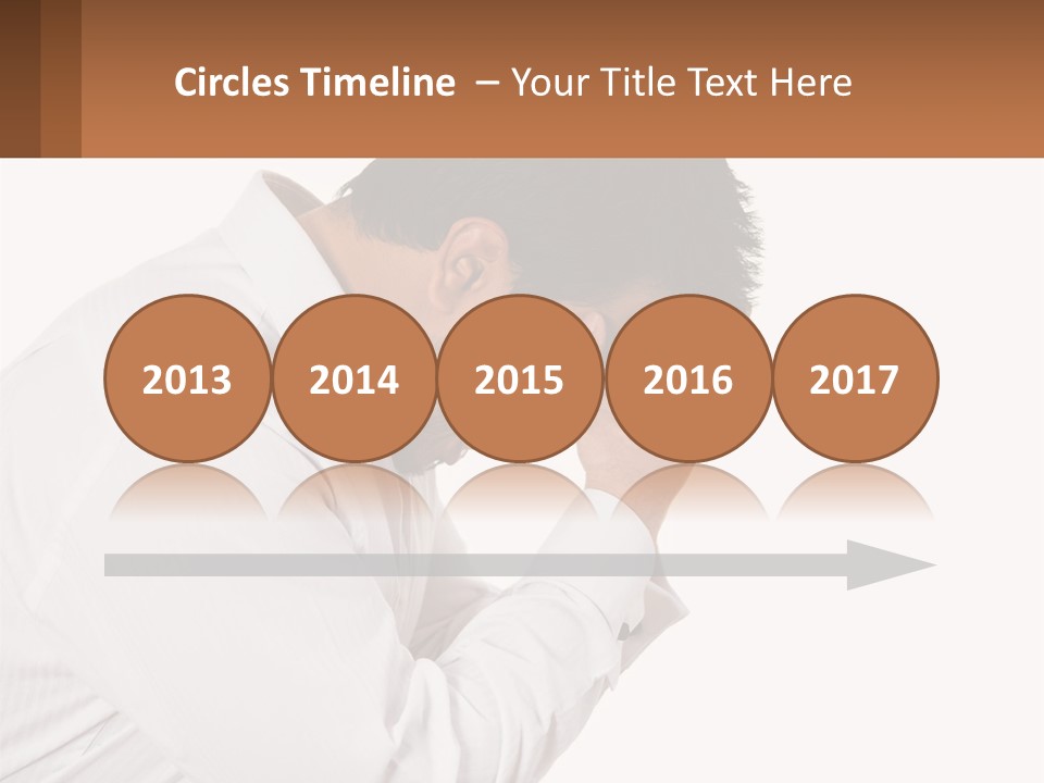 A Man Holding His Head In His Hands PowerPoint Template