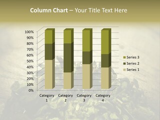A Metal Bowl Filled With Green Leaves On Top Of A Table PowerPoint Template