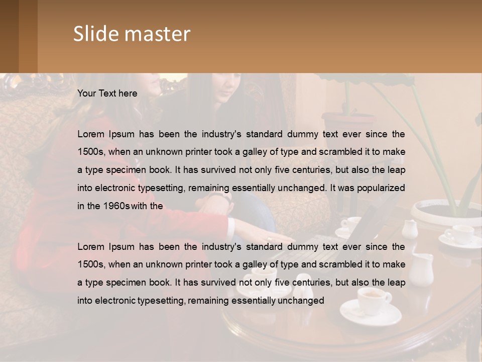 Two Women Sitting On A Couch Looking At A Laptop PowerPoint Template