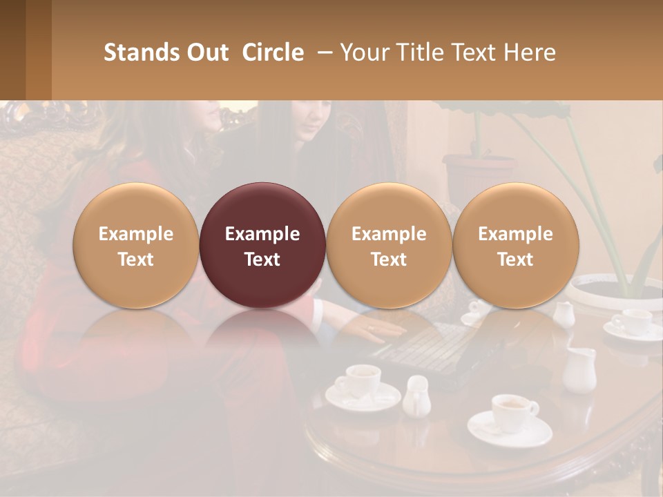 Two Women Sitting On A Couch Looking At A Laptop PowerPoint Template