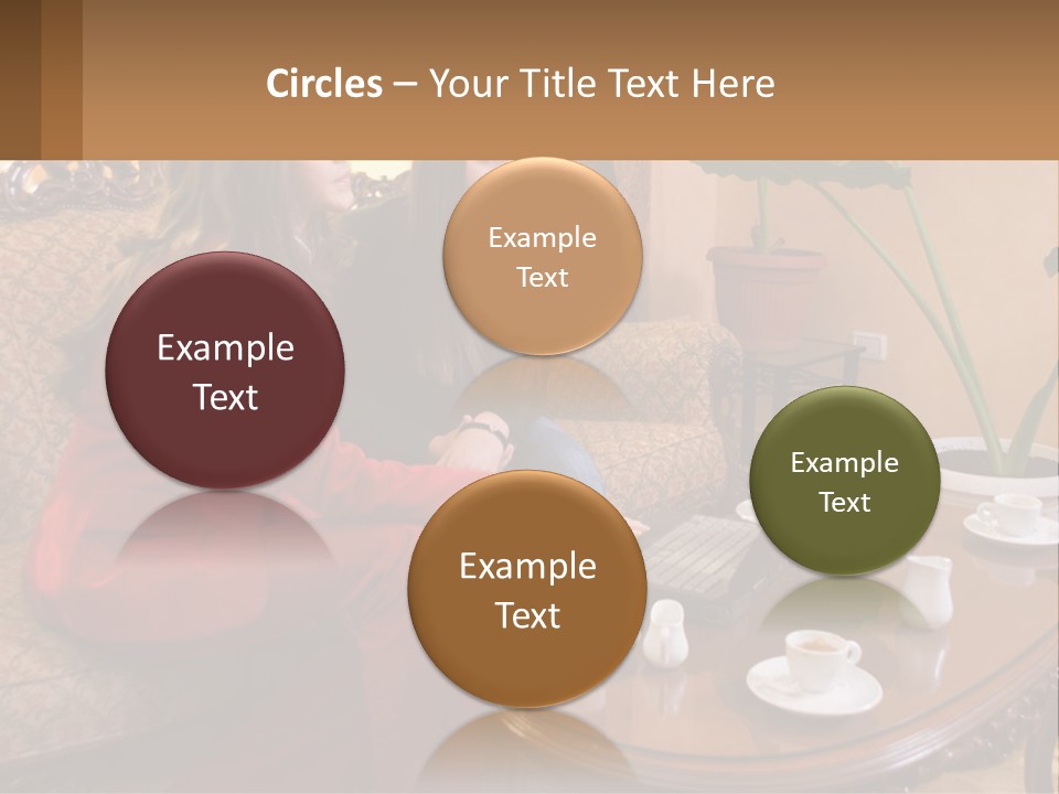 Two Women Sitting On A Couch Looking At A Laptop PowerPoint Template