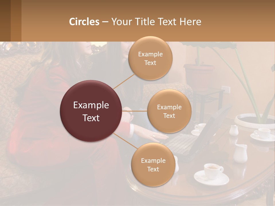 Two Women Sitting On A Couch Looking At A Laptop PowerPoint Template