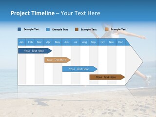 A Woman Running On The Beach With The Ocean In The Background PowerPoint Template