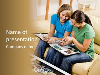 Two Women Sitting On A Couch Looking At A Magazine PowerPoint Template