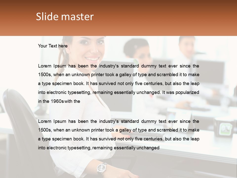 A Woman Sitting At A Desk In An Office PowerPoint Template