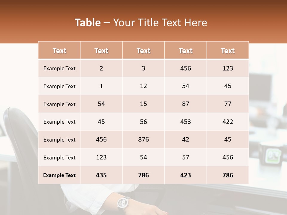 A Woman Sitting At A Desk In An Office PowerPoint Template